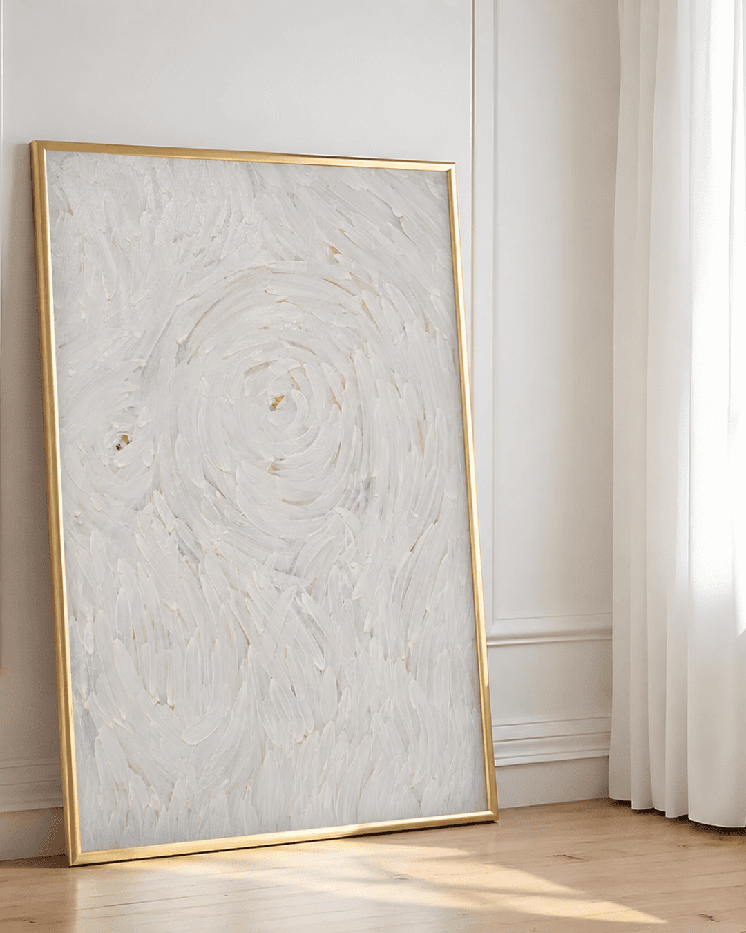 A large framed abstract painting leaning against a wall